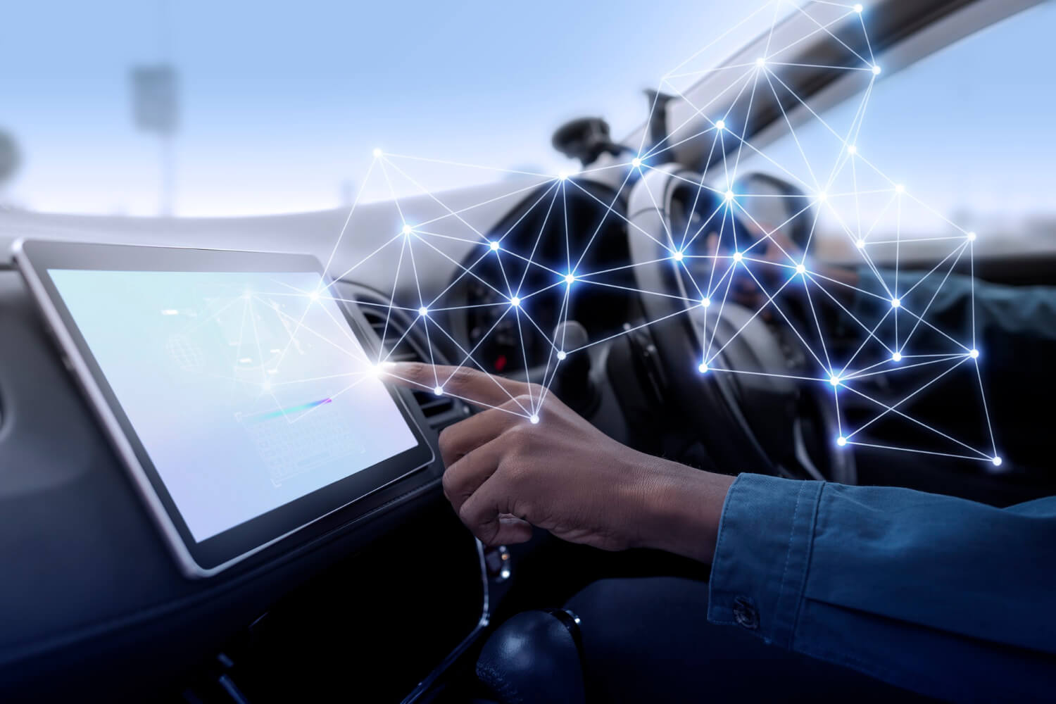 Driver operating an on-board touchscreen display