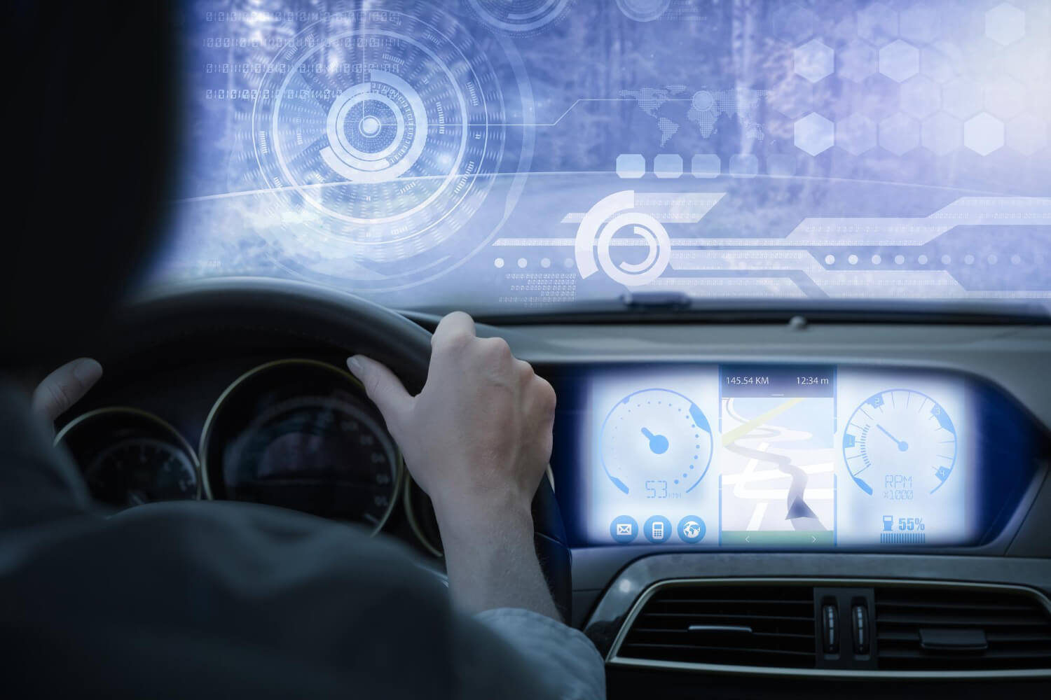 Driver at the wheel with a digital display on the dashboard